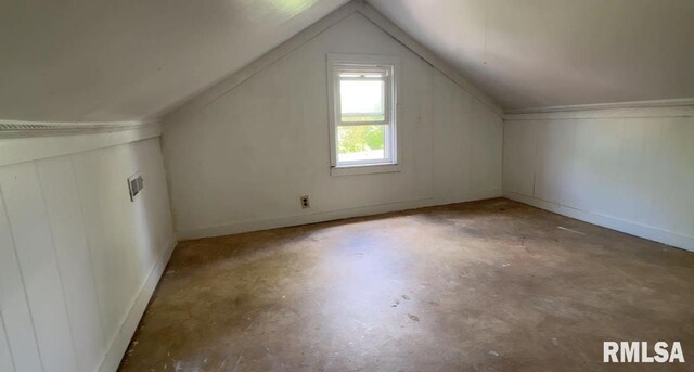 329 N Broadway Ave, Goreville, IL 62939 - bonus room with concrete floors, vaulted ceiling, and baseboards