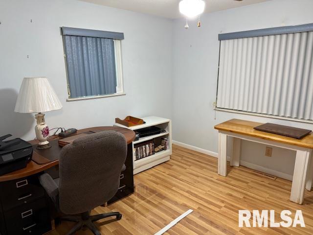 1700 W Taylor Dr, Carbondale, IL 62901 - office space featuring wood finished floors and baseboards