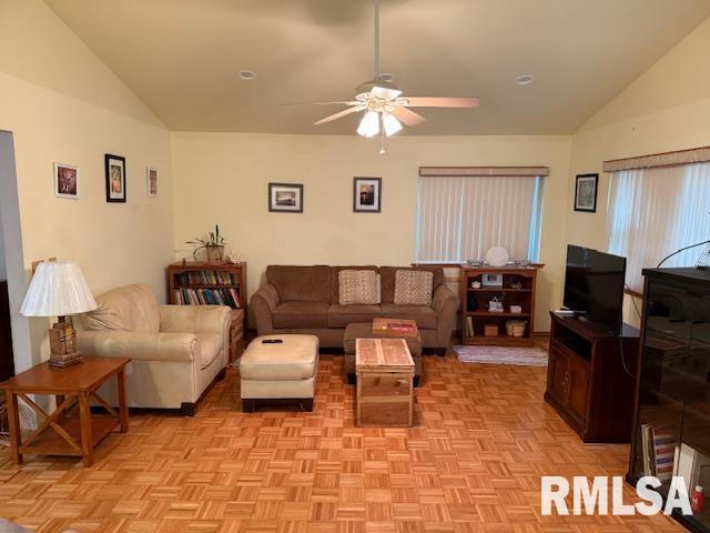 1700 W Taylor Dr, Carbondale, IL 62901 - living room with vaulted ceiling and a ceiling fan