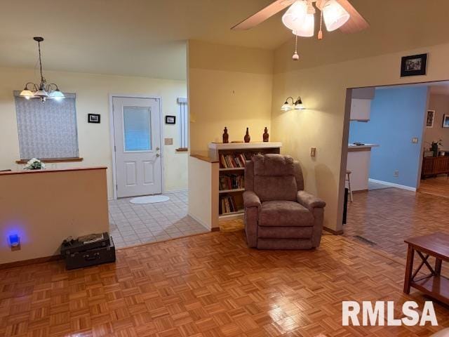 1700 W Taylor Dr, Carbondale, IL 62901 - living area featuring a ceiling fan and baseboards