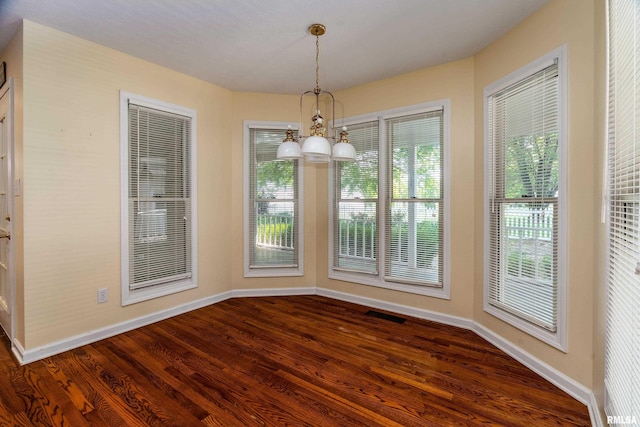1803 N Dawn Dr, Marion, IL 62959 - unfurnished dining area with dark wood finished floors and a chandelier