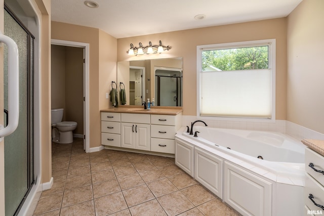 1803 N Dawn Dr, Marion, IL 62959 - bathroom with vanity, a stall shower, a jetted tub, and tile patterned floors