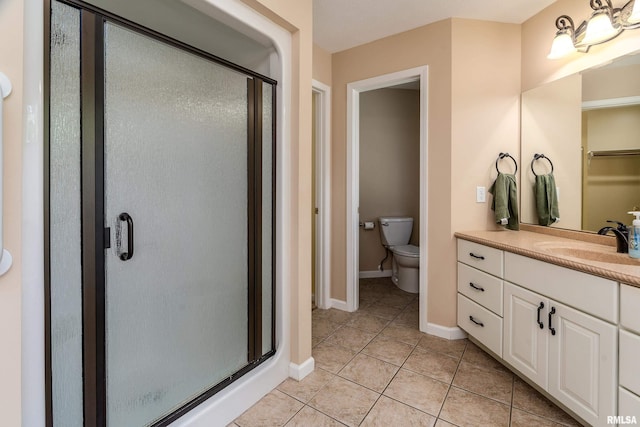 1803 N Dawn Dr, Marion, IL 62959 - bathroom featuring vanity, tile patterned floors, and a stall shower