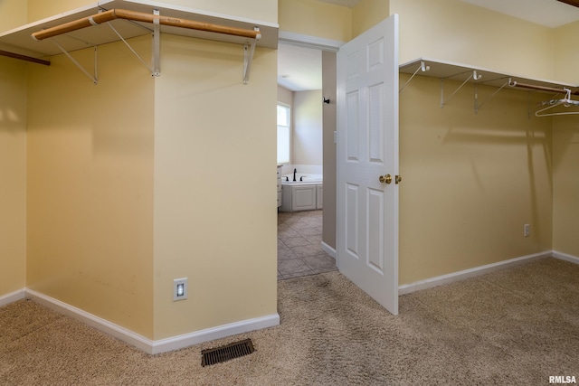 1803 N Dawn Dr, Marion, IL 62959 - spacious closet featuring carpet floors