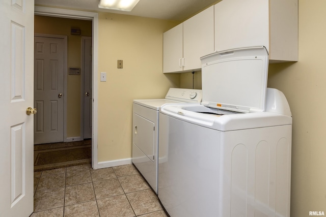 1803 N Dawn Dr, Marion, IL 62959 - laundry room featuring washer and dryer, cabinet space, and light tile patterned floors