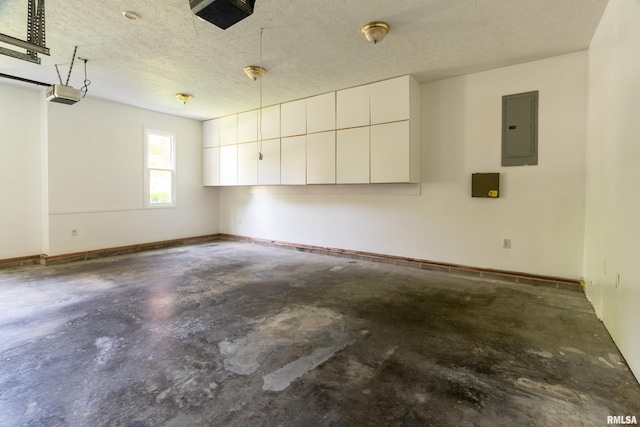 1803 N Dawn Dr, Marion, IL 62959 - garage featuring electric panel and a garage door opener
