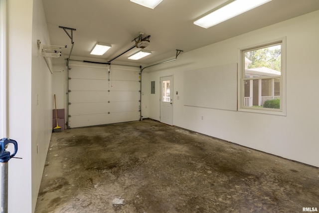 1803 N Dawn Dr, Marion, IL 62959 - garage featuring electric panel and a garage door opener