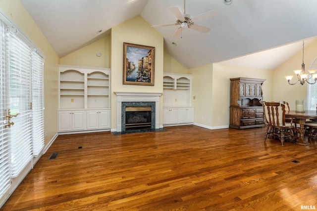 1803 N Dawn Dr, Marion, IL 62959 - living room featuring wood finished floors, a chandelier, a high end fireplace, high vaulted ceiling, and ceiling fan