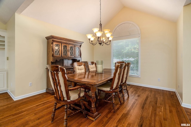 1803 N Dawn Dr, Marion, IL 62959 - dining area with a chandelier, vaulted ceiling, and wood finished floors
