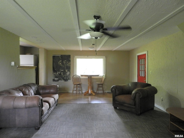 4370 Buncombe Rd, Vienna, IL 62995 - living room featuring a ceiling fan and a textured ceiling