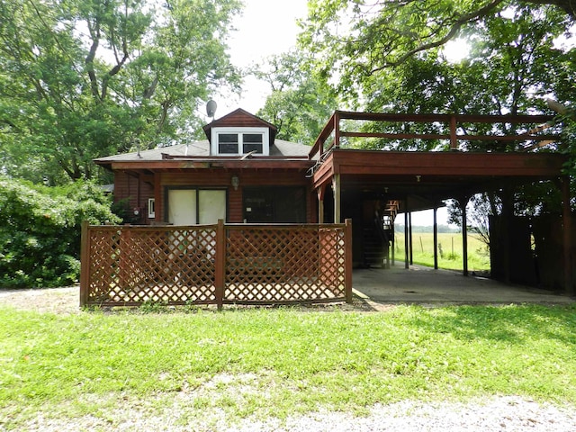 4370 Buncombe Rd, Vienna, IL 62995 - back of property with a yard and a wooden deck