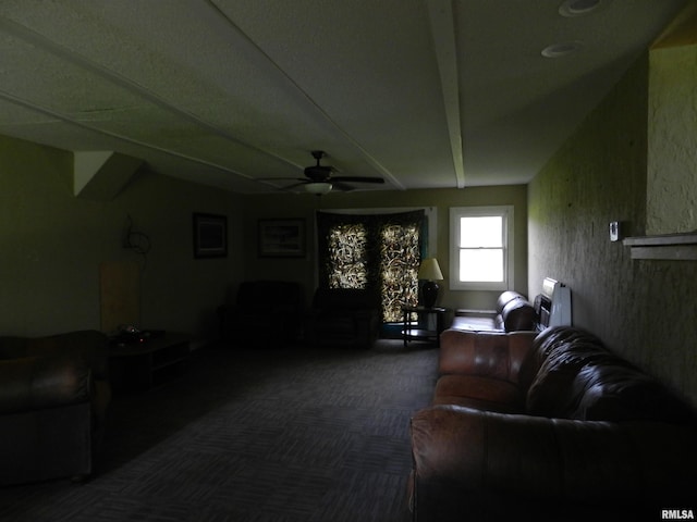 4370 Buncombe Rd, Vienna, IL 62995 - living room with a ceiling fan and dark carpet