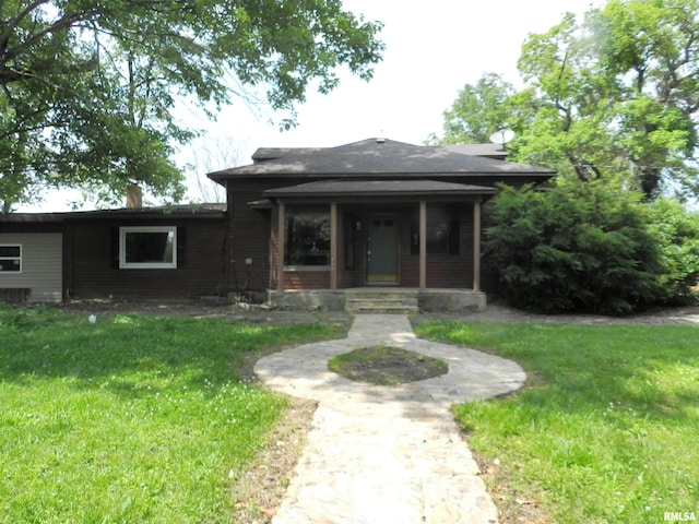4370 Buncombe Rd, Vienna, IL 62995 - view of front of house with a front lawn and covered porch