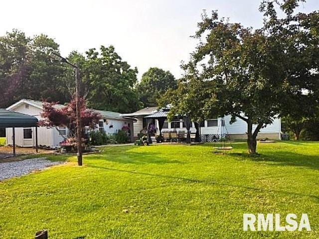 18802 E Fairfield Rd, Mount Vernon, IL 62864 - view of front of home featuring a front yard and a gazebo