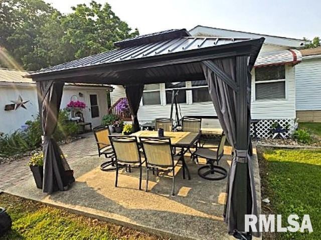 18802 E Fairfield Rd, Mount Vernon, IL 62864 - view of patio featuring a gazebo and outdoor dining space