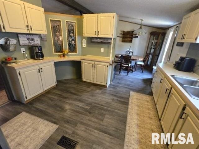 18802 E Fairfield Rd, Mount Vernon, IL 62864 - kitchen with light countertops, dark wood-style floors, and vaulted ceiling