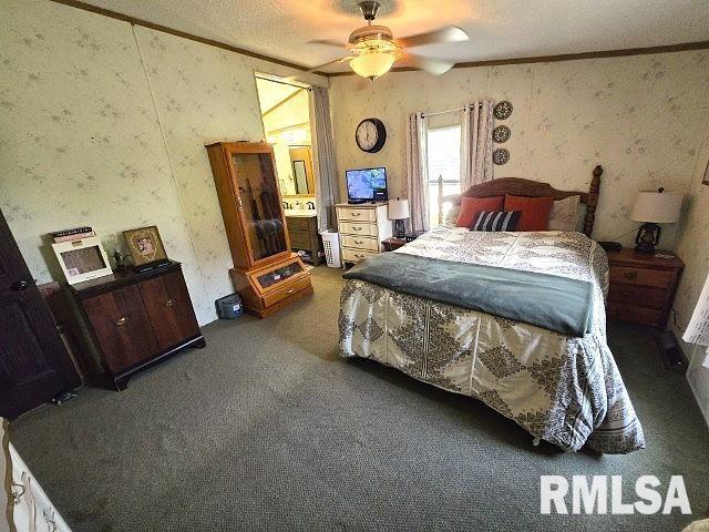 18802 E Fairfield Rd, Mount Vernon, IL 62864 - bedroom featuring wallpapered walls, carpet flooring, a textured ceiling, ornamental molding, and ceiling fan