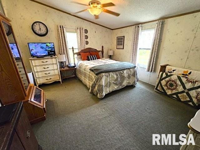 18802 E Fairfield Rd, Mount Vernon, IL 62864 - carpeted bedroom featuring ornamental molding, wallpapered walls, a textured ceiling, and a ceiling fan