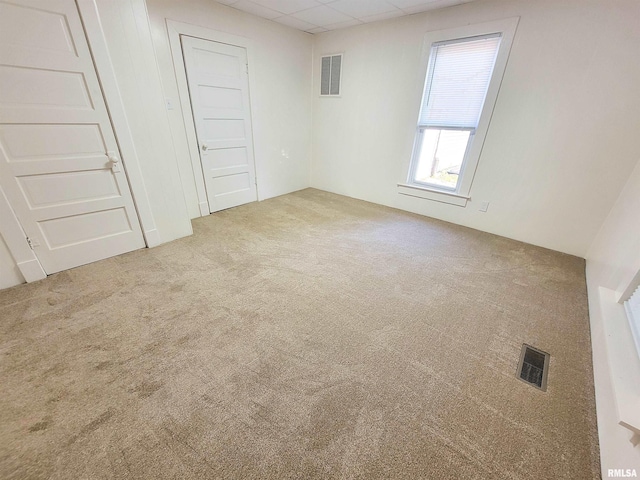 719 E Cherry St, Olney, IL 62450 - empty room featuring carpet floors