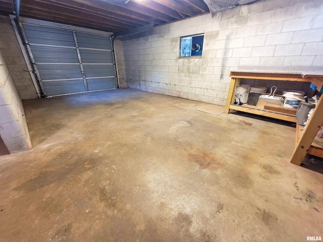 719 E Cherry St, Olney, IL 62450 - garage with concrete block wall