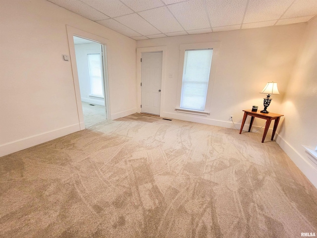 719 E Cherry St, Olney, IL 62450 - unfurnished room with carpet and a drop ceiling