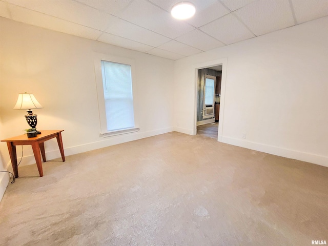 719 E Cherry St, Olney, IL 62450 - unfurnished room featuring a paneled ceiling and light colored carpet