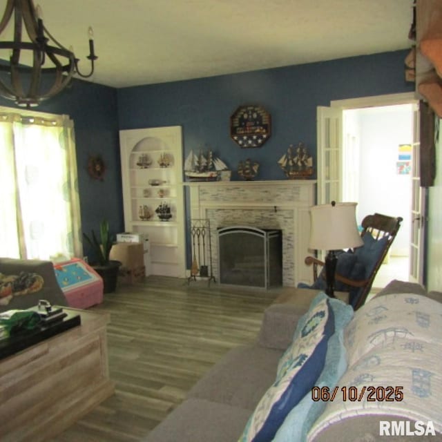 632 N Pershing St, Energy, IL 62933 - living area with a fireplace and wood finished floors