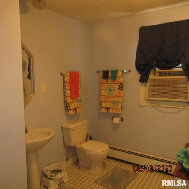 632 N Pershing St, Energy, IL 62933 - bathroom with baseboard heating, tile patterned floors, and cooling unit
