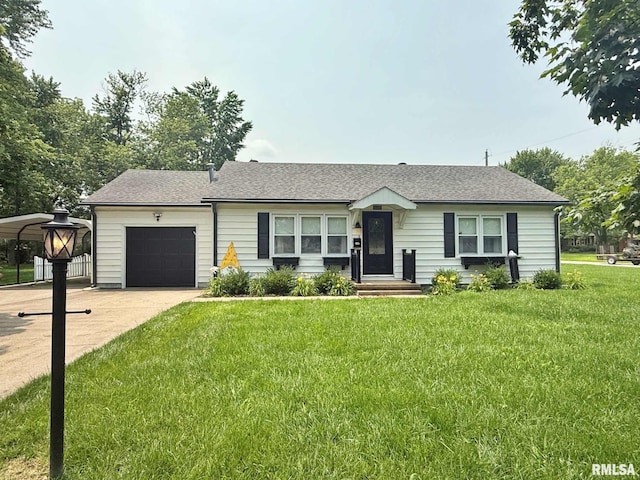 2223 N Ave, Metropolis, IL 62960 - view of front facade with a front yard, an attached garage, a shingled roof, and concrete driveway