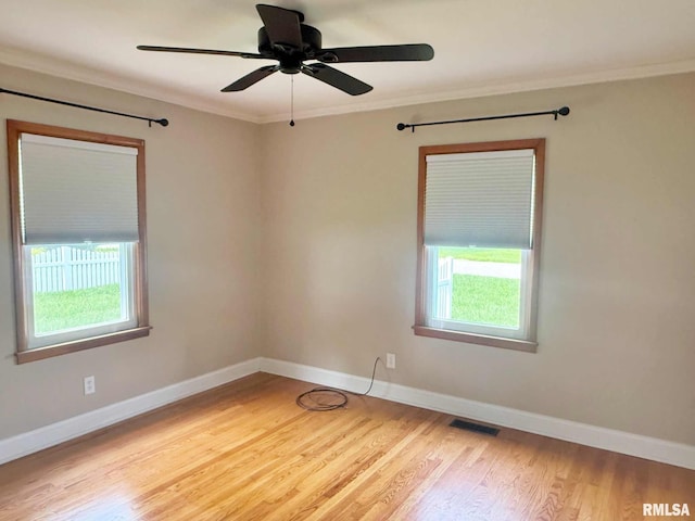 2223 N Ave, Metropolis, IL 62960 - empty room with crown molding, wood finished floors, and a ceiling fan