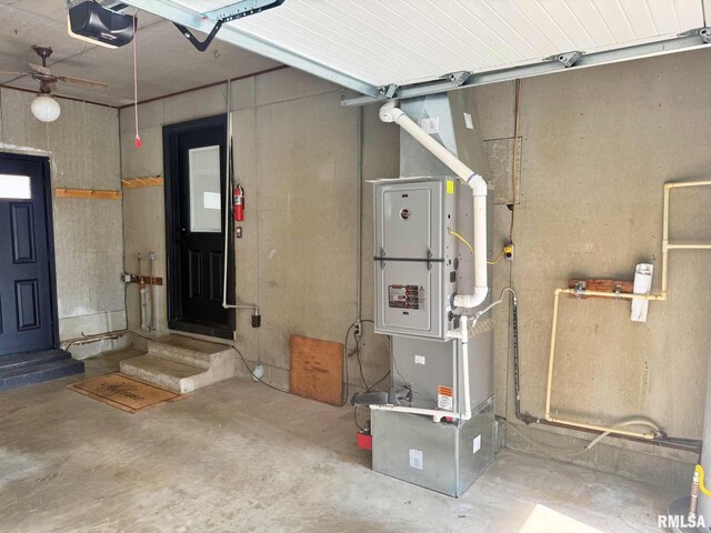 2223 N Ave, Metropolis, IL 62960 - garage featuring a garage door opener and ceiling fan