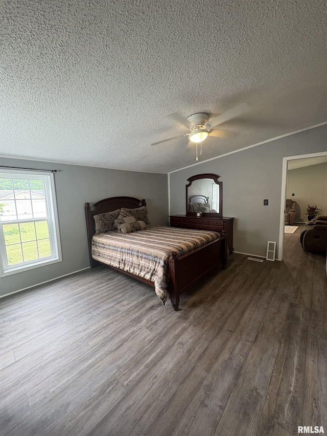 715 Wastena St, Benton, IL 62812 - bedroom featuring wood finished floors, a textured ceiling, and ceiling fan