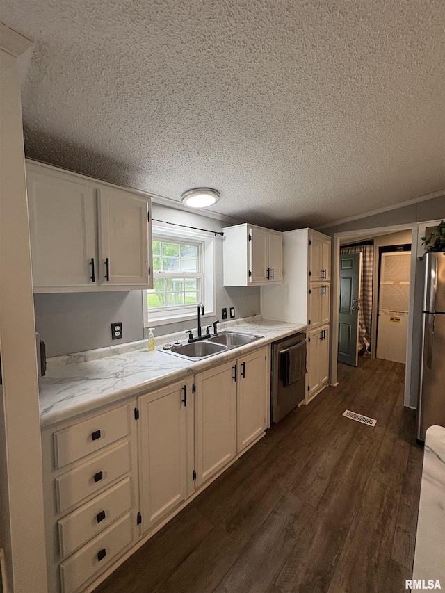 715 Wastena St, Benton, IL 62812 - bathroom featuring a textured ceiling, a shower stall, vaulted ceiling, wood finished floors, and a bath
