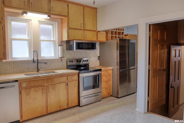 2036 Spruce St, Murphysboro, IL 62966 - kitchen with stainless steel appliances, light countertops, and tasteful backsplash