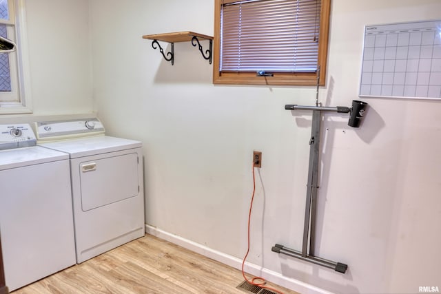 2036 Spruce St, Murphysboro, IL 62966 - laundry area with washing machine and dryer and light wood-style flooring