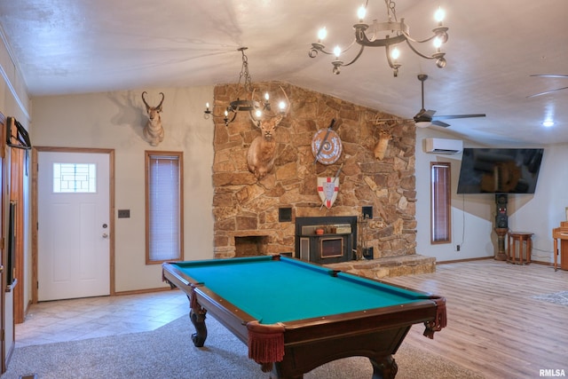 2036 Spruce St, Murphysboro, IL 62966 - recreation room featuring a wall mounted AC, lofted ceiling, a chandelier, billiards, and a fireplace
