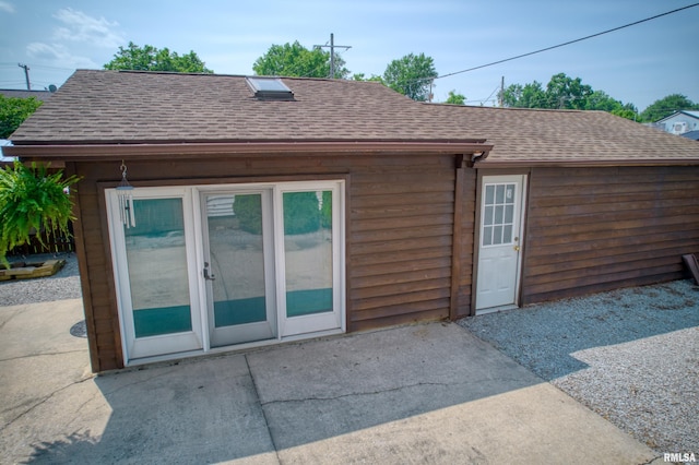 2036 Spruce St, Murphysboro, IL 62966 - back of house with roof with shingles and a patio