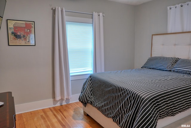 2036 Spruce St, Murphysboro, IL 62966 - bedroom featuring light wood-style flooring and baseboards