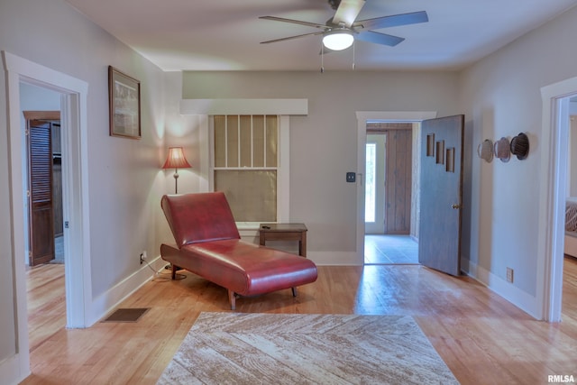 2036 Spruce St, Murphysboro, IL 62966 - sitting room with light wood finished floors and a ceiling fan