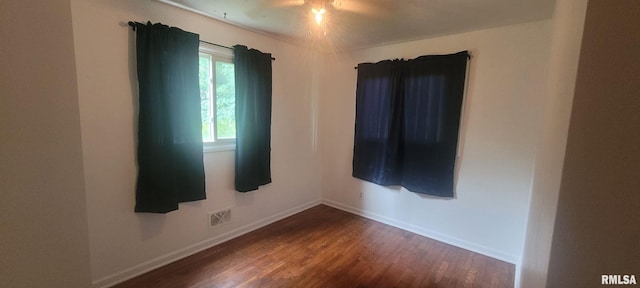 2903 Logan St, Mount Vernon, IL 62864 - empty room featuring dark wood-style flooring and ceiling fan