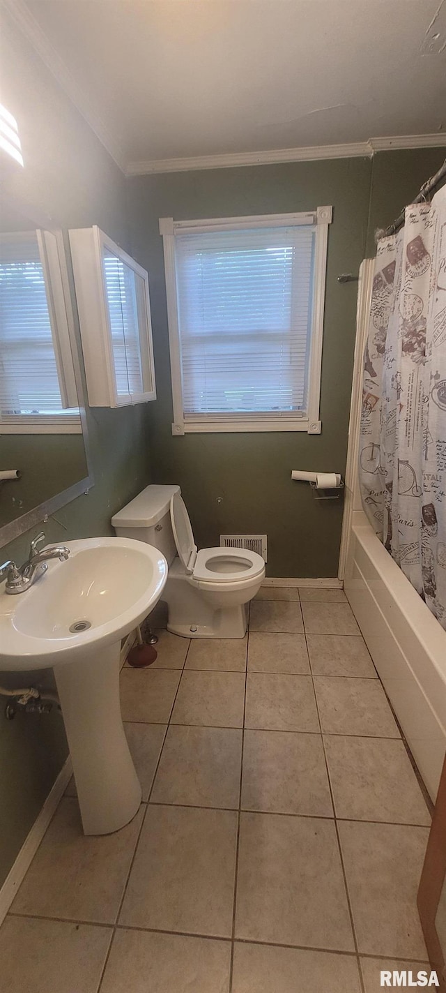 2903 Logan St, Mount Vernon, IL 62864 - full bathroom featuring ornamental molding, tile patterned floors, and shower / bathtub combination with curtain