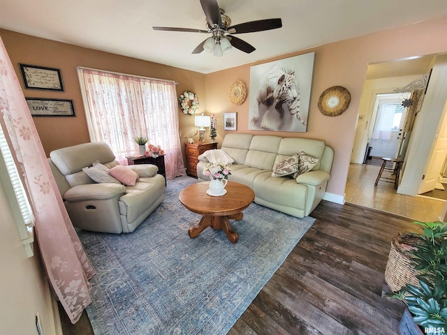 511 W 4th St, Flora, IL 62839 - living room featuring ceiling fan and wood finished floors