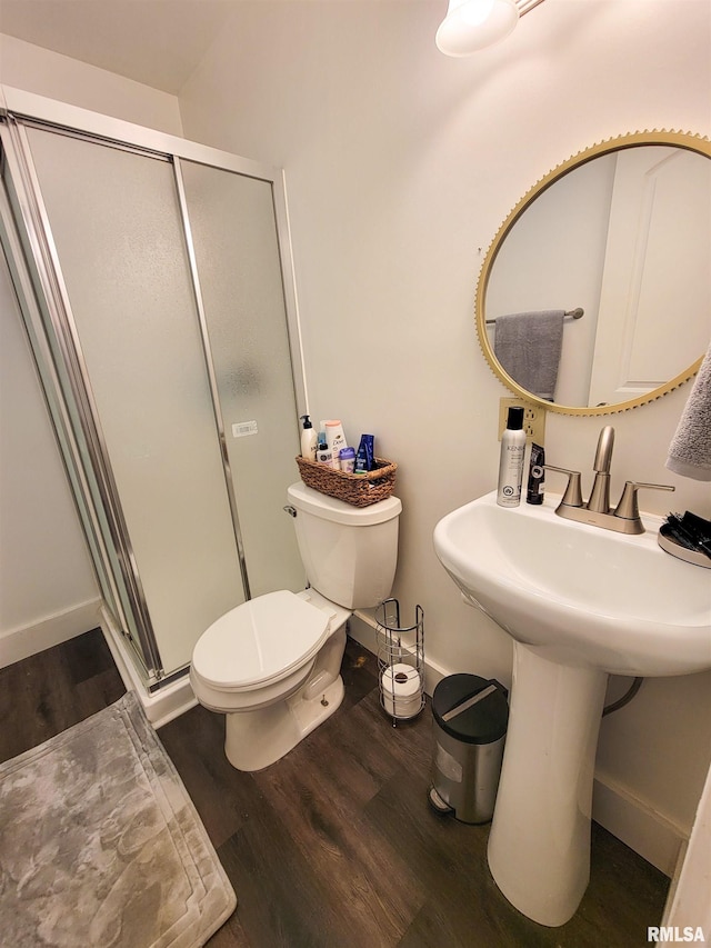 511 W 4th St, Flora, IL 62839 - full bathroom with wood finished floors and a shower stall