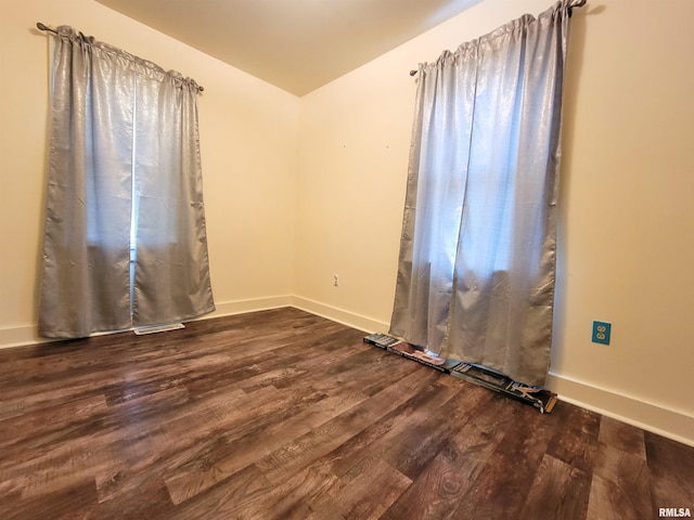 511 W 4th St, Flora, IL 62839 - spare room featuring wood finished floors and baseboards