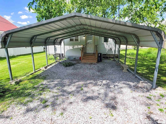 511 W 4th St, Flora, IL 62839 - view of vehicle parking with a detached carport