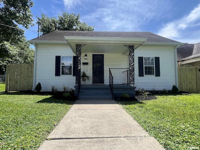 314 W 12th St, Metropolis, IL 62960 - bungalow-style house with covered porch and roof with shingles