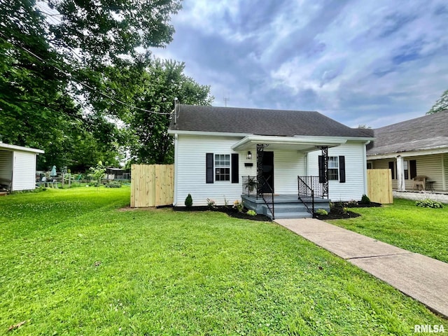 314 W 12th St, Metropolis, IL 62960 - bungalow with covered porch and roof with shingles