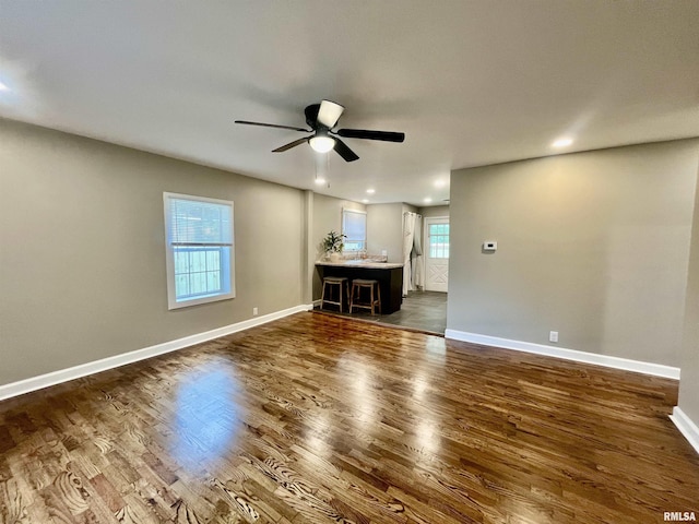 314 W 12th St, Metropolis, IL 62960 - unfurnished living room featuring ceiling fan, dark wood finished floors, and recessed lighting