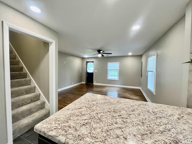 314 W 12th St, Metropolis, IL 62960 - unfurnished living room featuring ceiling fan, recessed lighting, stairway, and dark wood-style floors