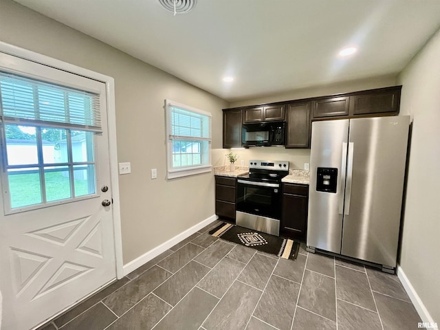 314 W 12th St, Metropolis, IL 62960 - kitchen with stainless steel appliances, dark brown cabinetry, and recessed lighting